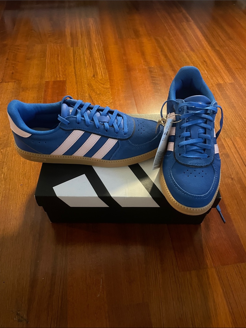 adidas Women’s Blue Sneakers with White Stripes